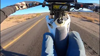 Ripping husky FX350 dirt bike wheelies