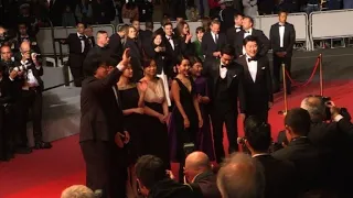 'Parasite' director and cast walk Cannes red carpet