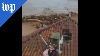 Rooftop rescue of flood victims in Brazil