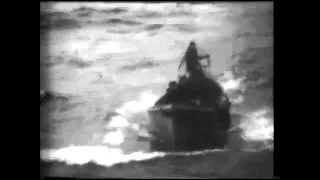 A Japanese Kamikaze plane crashes into United States aircraft carrier Essex in th...HD Stock Footage
