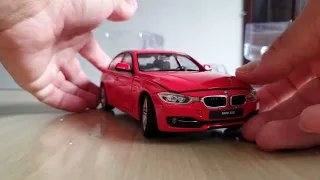 Unboxing da miniatura BMW 335i-vermelha da welly escala 1/24