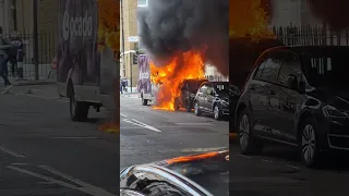 ocado van burns, and the car in front catches fire, too. London, 9th of May 2023