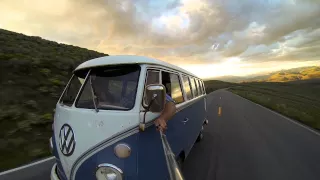 VW Microbus driving over Dunraven Pass.  Royalty free thanks to Kevin Macleod.