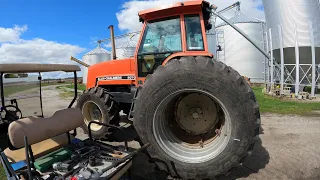 Allis-Chalmers 8070, getting a flat tire fixed.