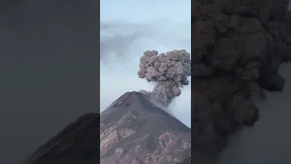 Zoomed in Footage of Volcanic Eruption During a Majestic Sunrise