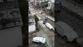 Car slides and crash down icy Seattle hill