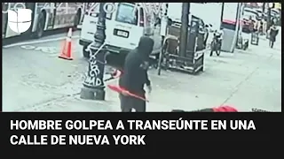 Brutal agresión: hombre golpea violentamente con un bate a un transeúnte en una calle en Nueva York