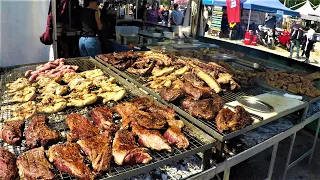 Cutting Ribs and Grilled Meat. Argentina Street Food. Biker Fest 2022. Lignano, Italy