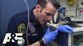 Nightwatch: Dan Helps Gunshot Victim to Stay Awake (S2 Flashback) | A&E