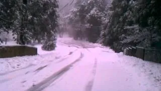 ROBERT SLEDDING IN SNOW CRESTLINE CA