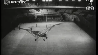 Helicopter flies inside building (1938)