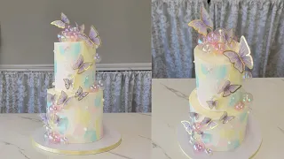 LOVEEE this Soft Pastel Palette Knife Cake with Butterflies and Iridescent Globes | Cake Decorating