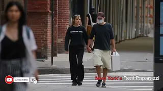 Robert Pattinson and girlfriend Suki Waterhouse hold hands as they walk around in NYC