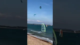 Kiteboarders and Surfers at Calshot Beach, Southampton, Hampshire