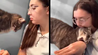 Girl Bites Her Cat Back