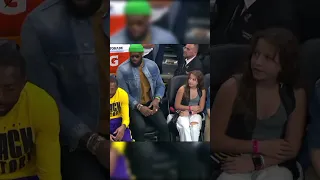 Young girl viral when she realizes LeBron setting next to her😍#shorts