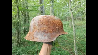 Battle of the bulge metaldetecting! German and US helmets found! ww2/WWII metaldetecting