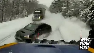 VIDEO: Speeding driver crashes directly into plow while trying to pass a semi on snowy NY road