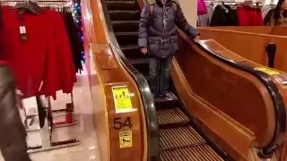 Vintage Otis wooden escalators at Macy's Herald Square