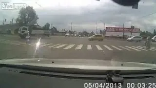 Woman Almost Electrocuted While Crossing Street [Dash Cam]