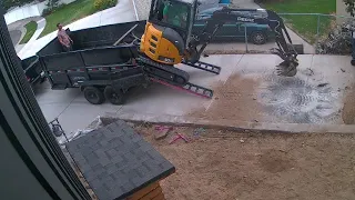 Having a little trouble loading excavator in dump trailer