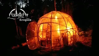 Bushcraft Dome Built From Branches and Plastic Wrap