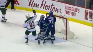 Erik Haula tips home shot to tie game