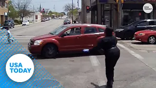 Boy walking straight into traffic saved by bus driver | USA TODAY