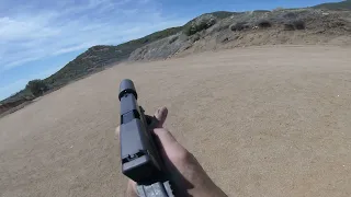 Initial test firing of Glock 17 in 9mm with auto sear &  Silencerco Omega 9k suppressor.