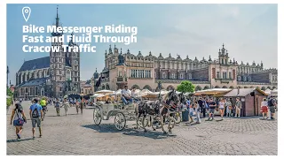 Bike Messenger Riding Fast and Fluid Through Cracow Traffic