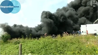 Striking French ferry workers burn tyres at entrance to Calais port