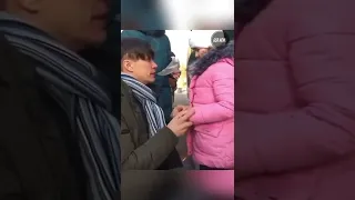 Ukrainian father says goodbye to his kids while he stays behind to fight