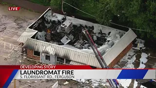 Dozens of crews respond to laundromat fire in Ferguson