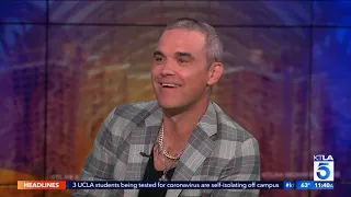 British Rockstar Robbie Williams on Breaking America One Person at a Time