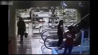 Old Woman Gets Stuck On Escalator Rail