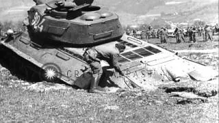 Soviet Army Lend-lease M-4 tank pulls Soviet tank out of mud hole in Liezen, Aust...HD Stock Footage