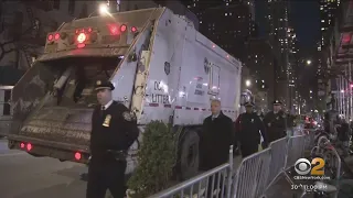 NYPD clears asylum seeker encampment outside Manhattan hotel