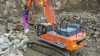 Doosan DX530 excavator with Indeco HP9000FS hammer