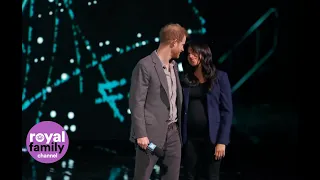 Duchess of Sussex makes surprise appearance on stage during Prince Harry’s speech