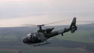 Army Air Corp Gazelle Helicopter and TB20 formation flying and cloud surfing