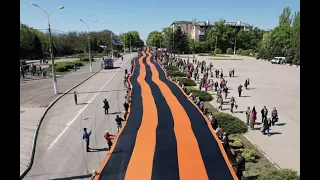 Victory Day march in ruined Ukrainian city of Mariupol