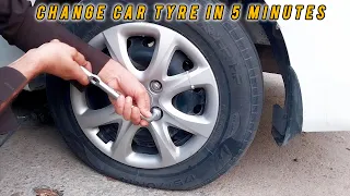 how to change a car tire on the road