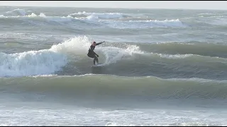 Windy surf at big pier Vorupør