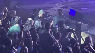 Ian Astbury from The Cult dives off stage to save an audience member from a chokehold