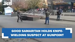 Good Samaritan holds suspect at gunpoint