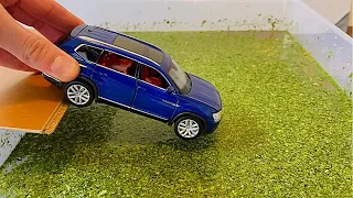 Diecast Cars Sliding Into The Water