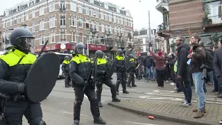 Police clash with anti-lockdown protesters in Amsterdam