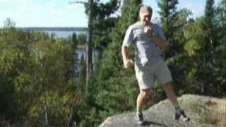 ian dancing at the edge of a cliff