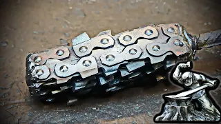 Damascus steel from an old chainsaw chain.