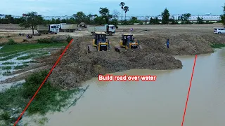 How amazing a twin SHANTUI DH17-C2 bulldozer work together filling over water
